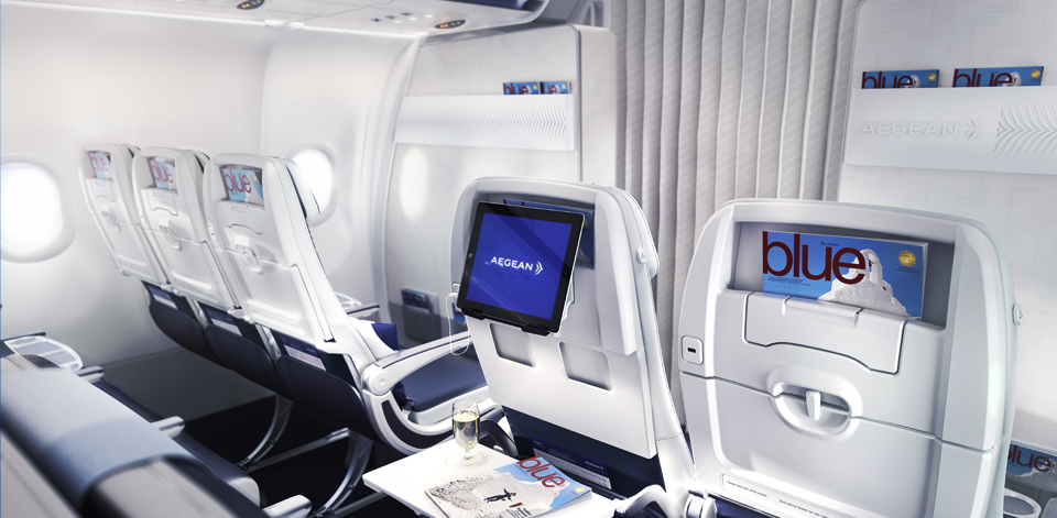 seats inside of the aircraft cabin in business class